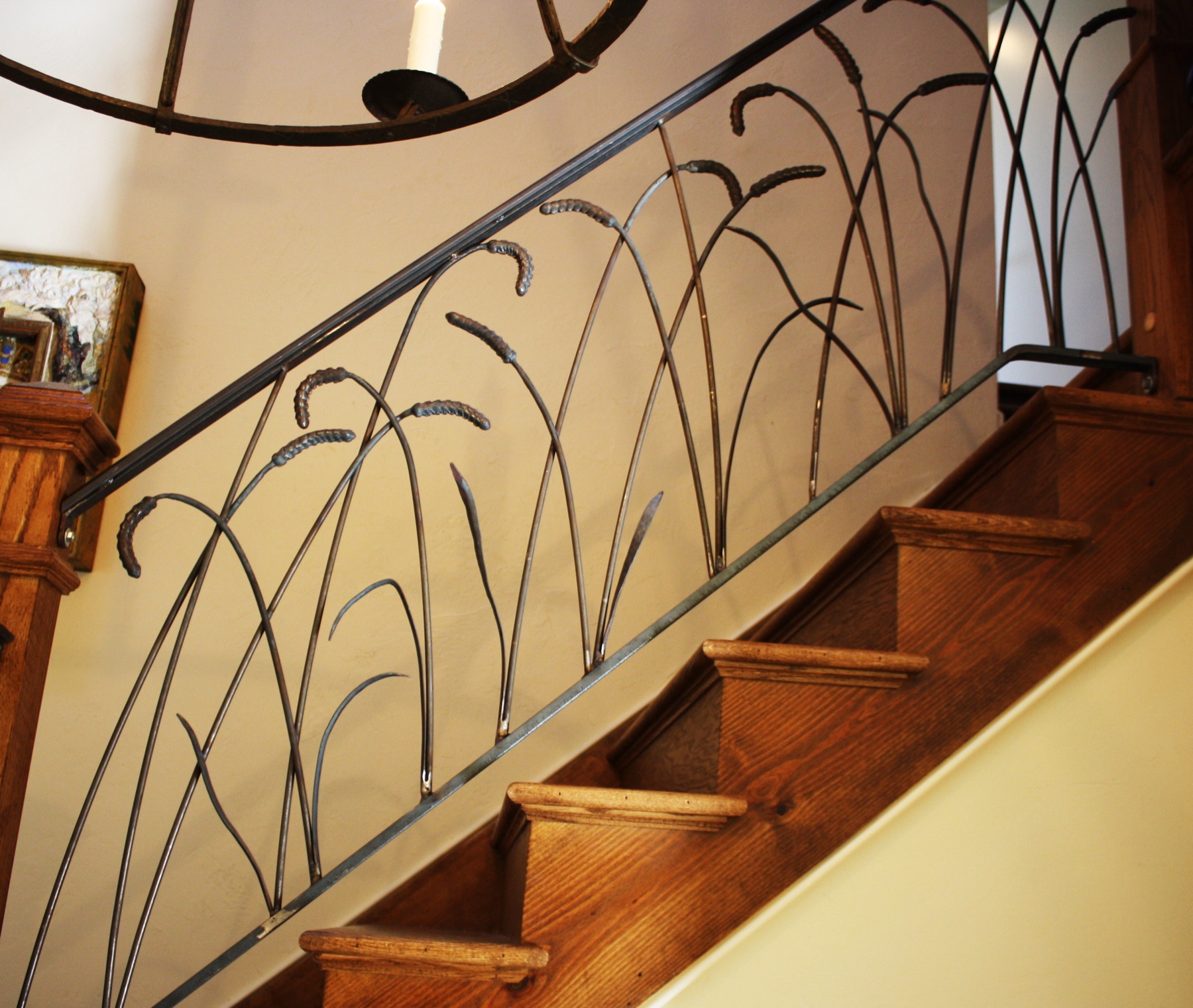 Ornamental custom iron railing laid out in the shop